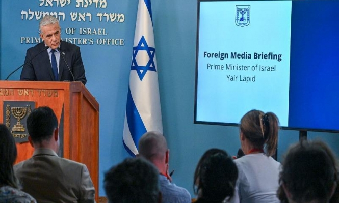 لبيد ضد بايدن: الاتفاق النووي لا يستوفي المعايير التي حددها